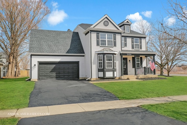 view of front of home with aphalt driveway, a shingled roof, covered porch, a front yard, and an attached garage