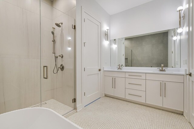 bathroom with a freestanding tub, tile walls, a shower stall, and tile patterned flooring