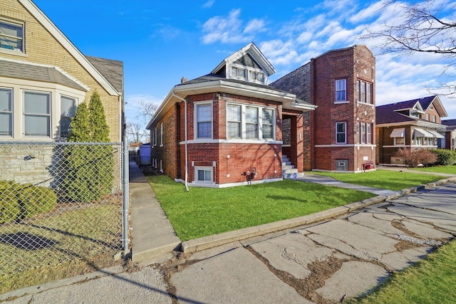 bungalow-style house featuring brick siding, a front yard, and fence