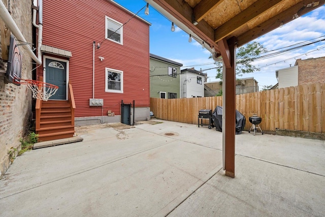 view of patio / terrace with fence