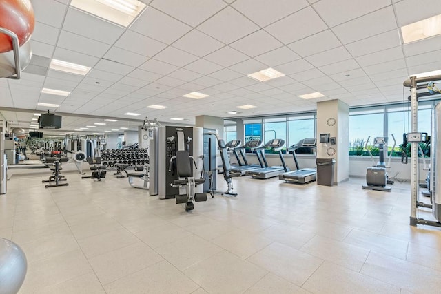 gym featuring a paneled ceiling