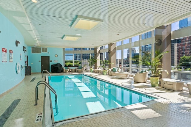 community pool with a patio area