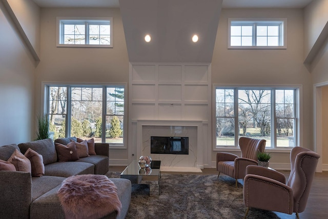 511 N Branch Rd, Glenview, IL 60025 - living area with a high ceiling, a healthy amount of sunlight, and a premium fireplace