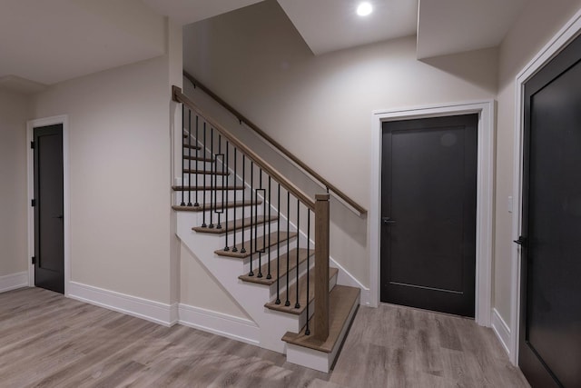 511 N Branch Rd, Glenview, IL 60025 - staircase with baseboards and wood finished floors