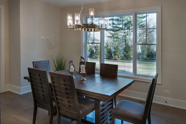 511 N Branch Rd, Glenview, IL 60025 - dining space with baseboards, dark wood finished floors, and a notable chandelier
