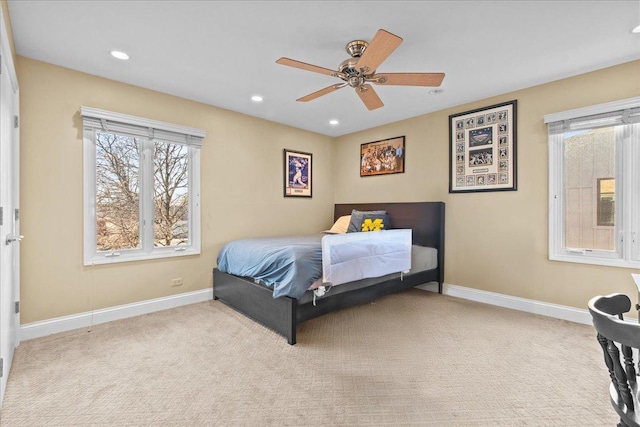 carpeted bedroom with recessed lighting, baseboards, and a ceiling fan