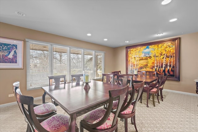 dining area featuring recessed lighting, light colored carpet, and baseboards