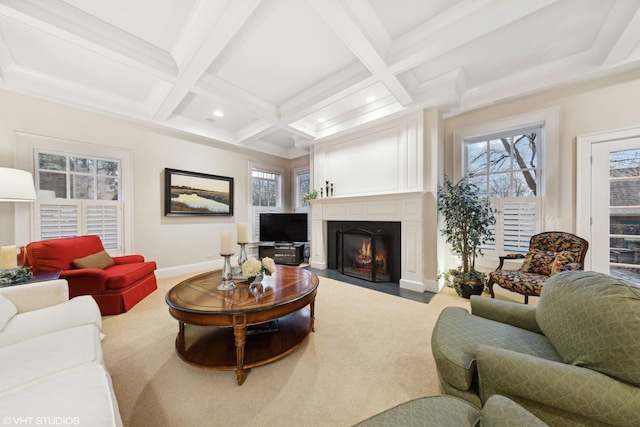 living area with baseboards, carpet, a fireplace with flush hearth, beam ceiling, and coffered ceiling