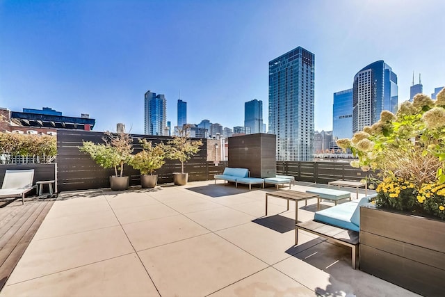 view of patio / terrace featuring a city view