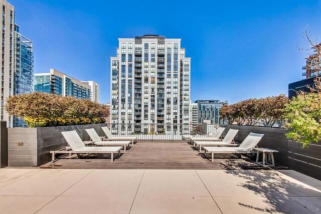 view of patio / terrace featuring a city view