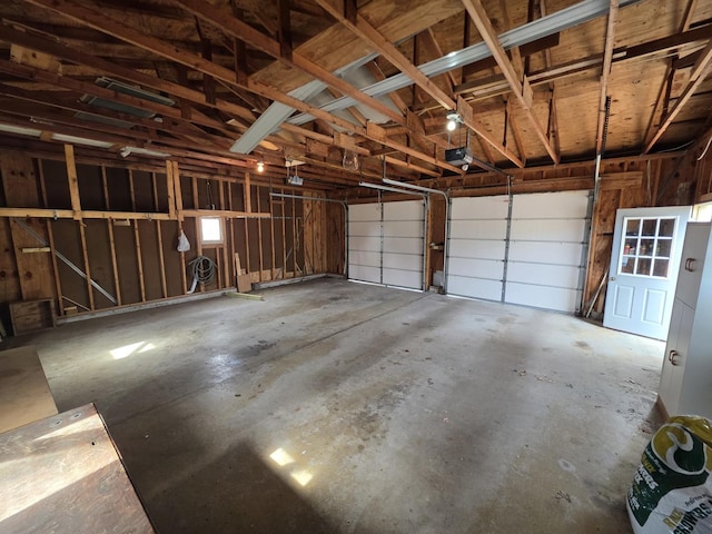 garage featuring a garage door opener