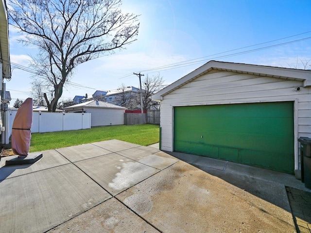 detached garage with fence