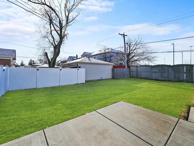 view of yard with a patio area and a fenced backyard