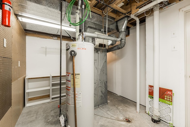 utility room with water heater