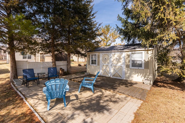 view of patio / terrace featuring an outbuilding