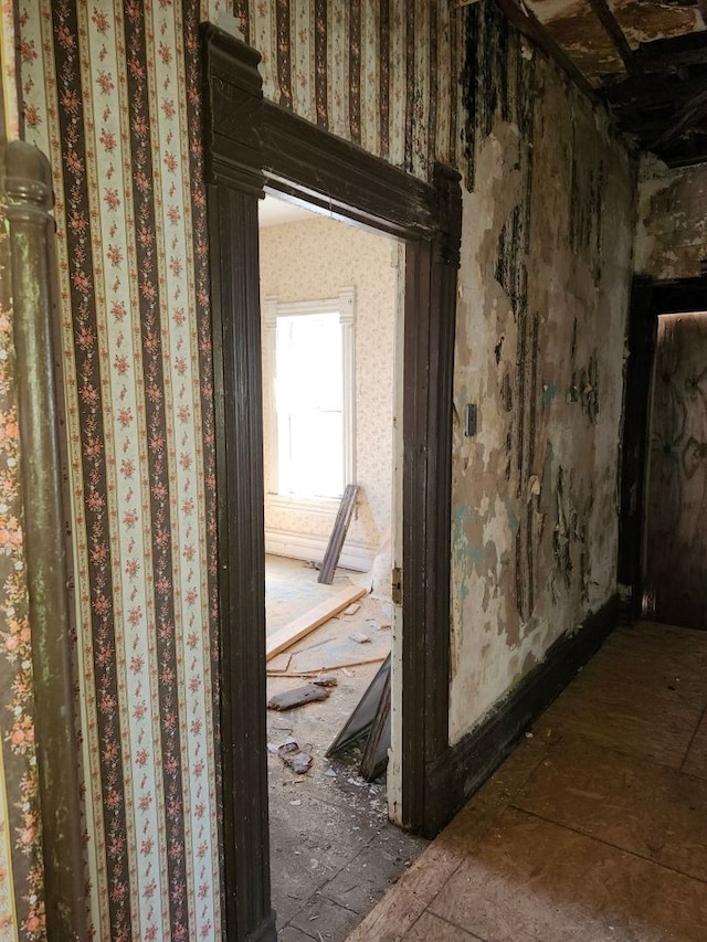 corridor with wallpapered walls