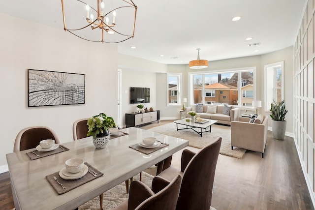 dining area with visible vents, recessed lighting, wood finished floors, and baseboards