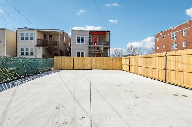 view of patio featuring fence