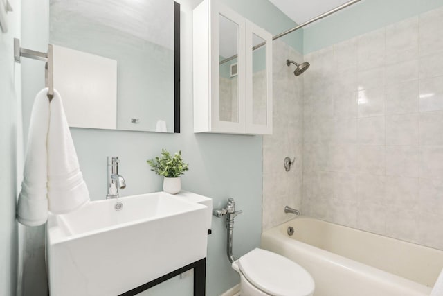 full bathroom with vanity, toilet, and shower / tub combination