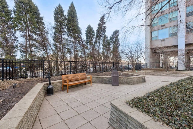 view of patio featuring fence