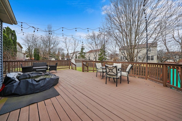 wooden deck with outdoor lounge area