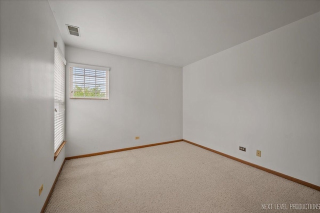109 Oxford Ct Unit 0, Oswego, IL 60543 - spare room with carpet flooring and baseboards