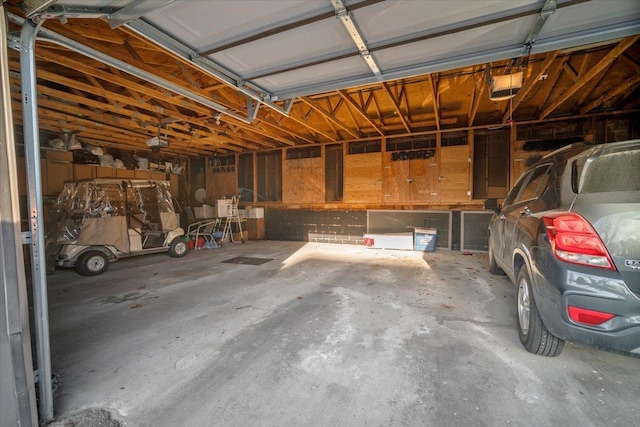 garage featuring a garage door opener