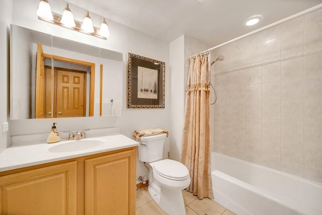 full bathroom featuring tile patterned flooring, shower / tub combo with curtain, toilet, and vanity