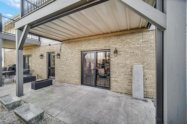 view of patio / terrace featuring a balcony