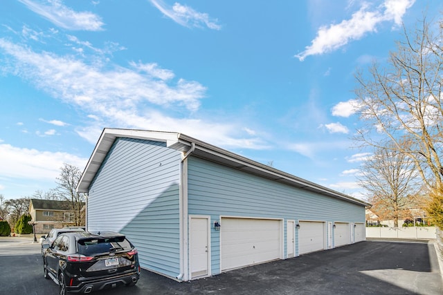 garage featuring fence