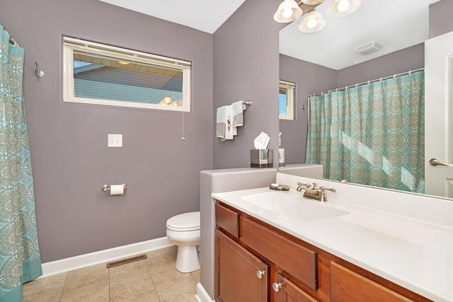 full bathroom with vanity, baseboards, visible vents, tile patterned flooring, and toilet