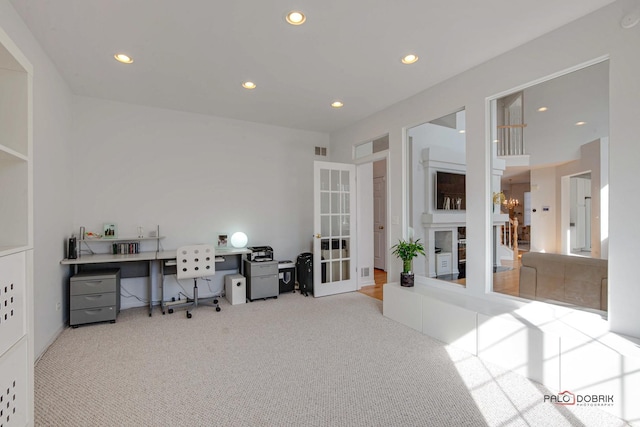 office with recessed lighting, french doors, a fireplace, and carpet floors