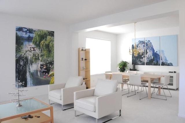 living area with a chandelier and finished concrete floors