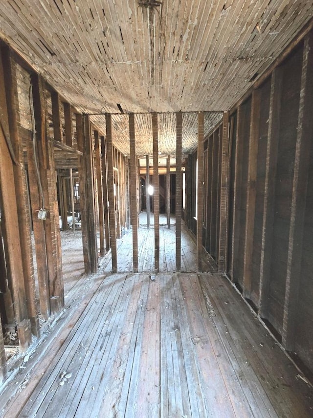 misc room featuring hardwood / wood-style floors and wooden ceiling