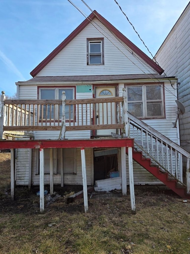 back of house with stairway and a wooden deck