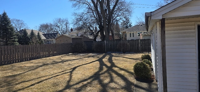 view of yard with a fenced backyard