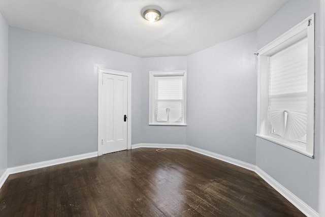 8025 S Evans Ave, Chicago, IL 60619 - spare room featuring wood finished floors and baseboards
