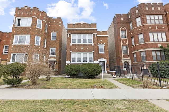 view of property with fence