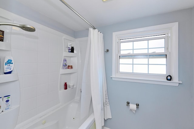 full bath with shower / bath combination with curtain