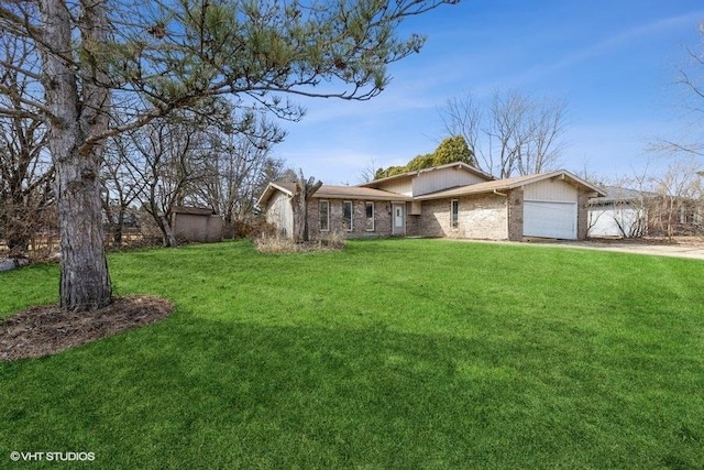 view of front of house with brick siding, a garage, concrete driveway, and a front yard