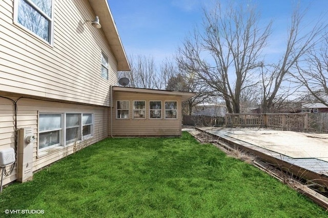 view of yard featuring a patio and fence