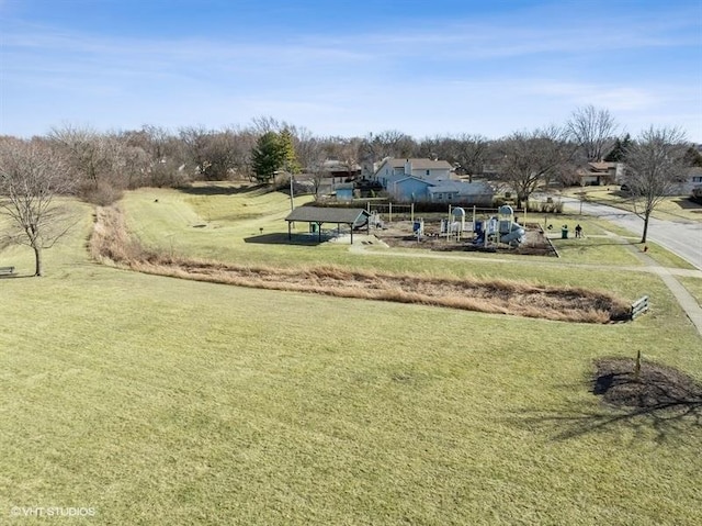 view of community with a lawn