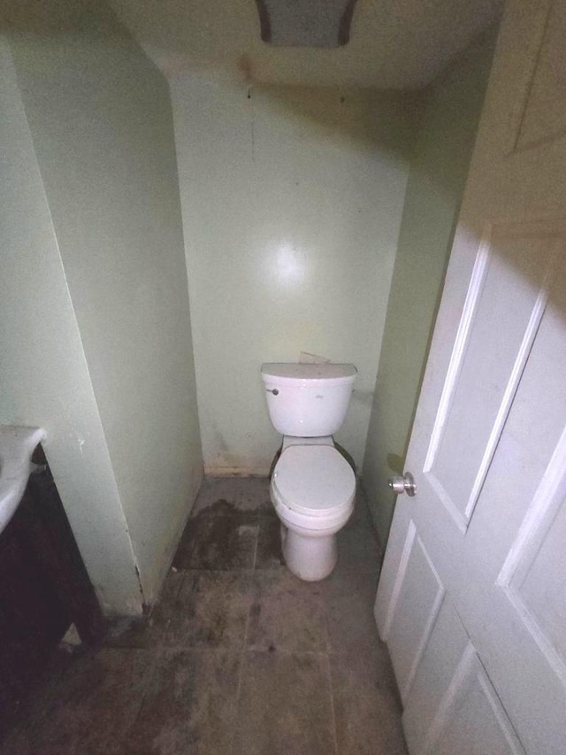 bathroom featuring toilet