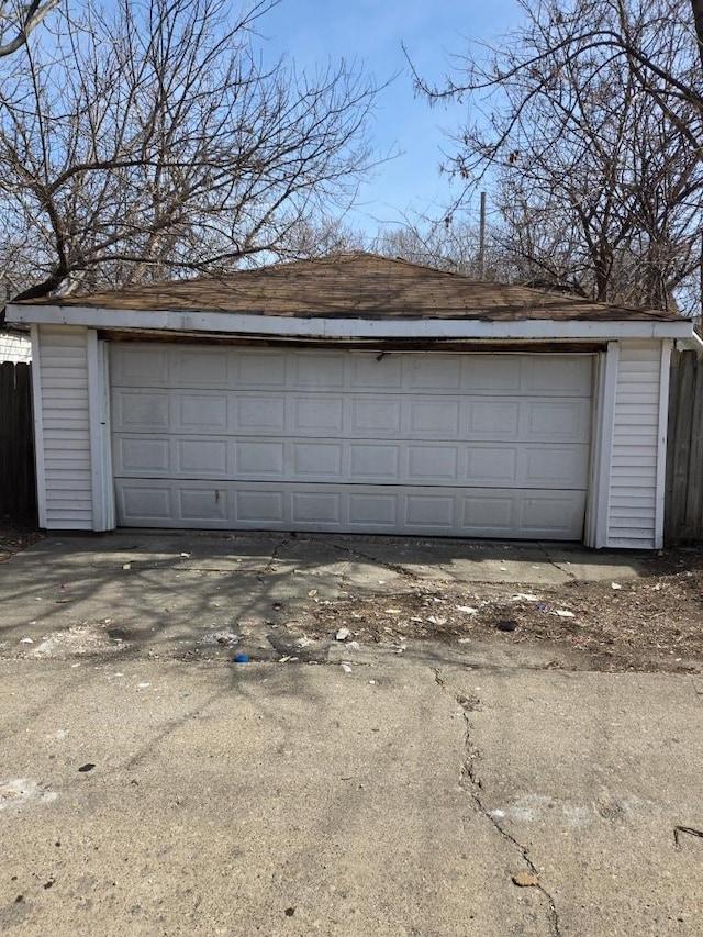 detached garage with fence