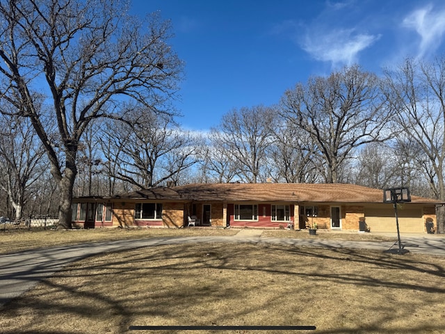 ranch-style home with brick siding