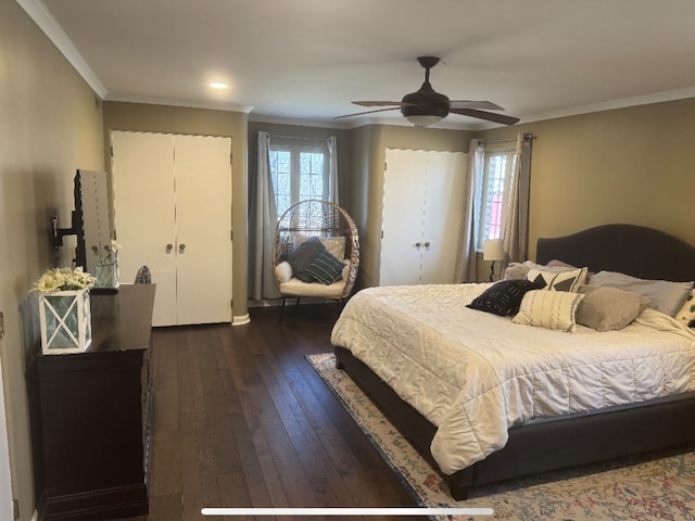 bedroom with multiple windows, ceiling fan, dark wood-style flooring, and crown molding