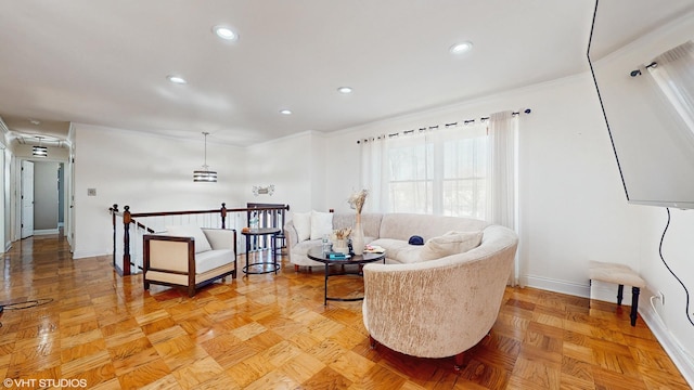 living area featuring recessed lighting, an upstairs landing, and baseboards