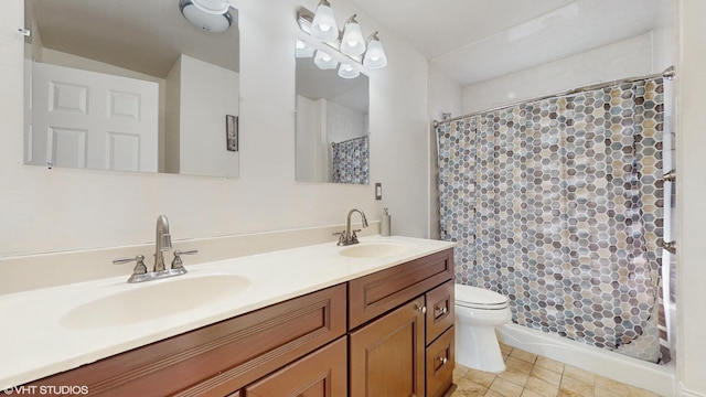 full bathroom featuring a shower with curtain, double vanity, toilet, and a sink