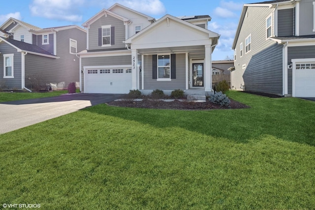 view of front of home featuring an attached garage, concrete driveway, and a front lawn