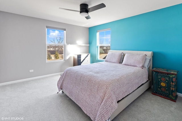 bedroom with carpet, baseboards, and ceiling fan